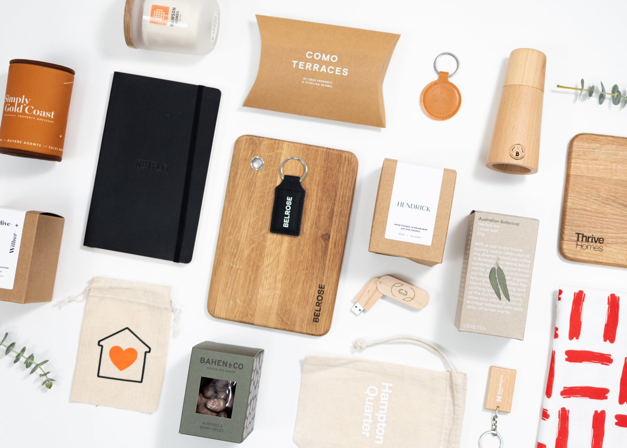 Custom-branded corporate gift hampers with company logo's and sustainable products and packaging