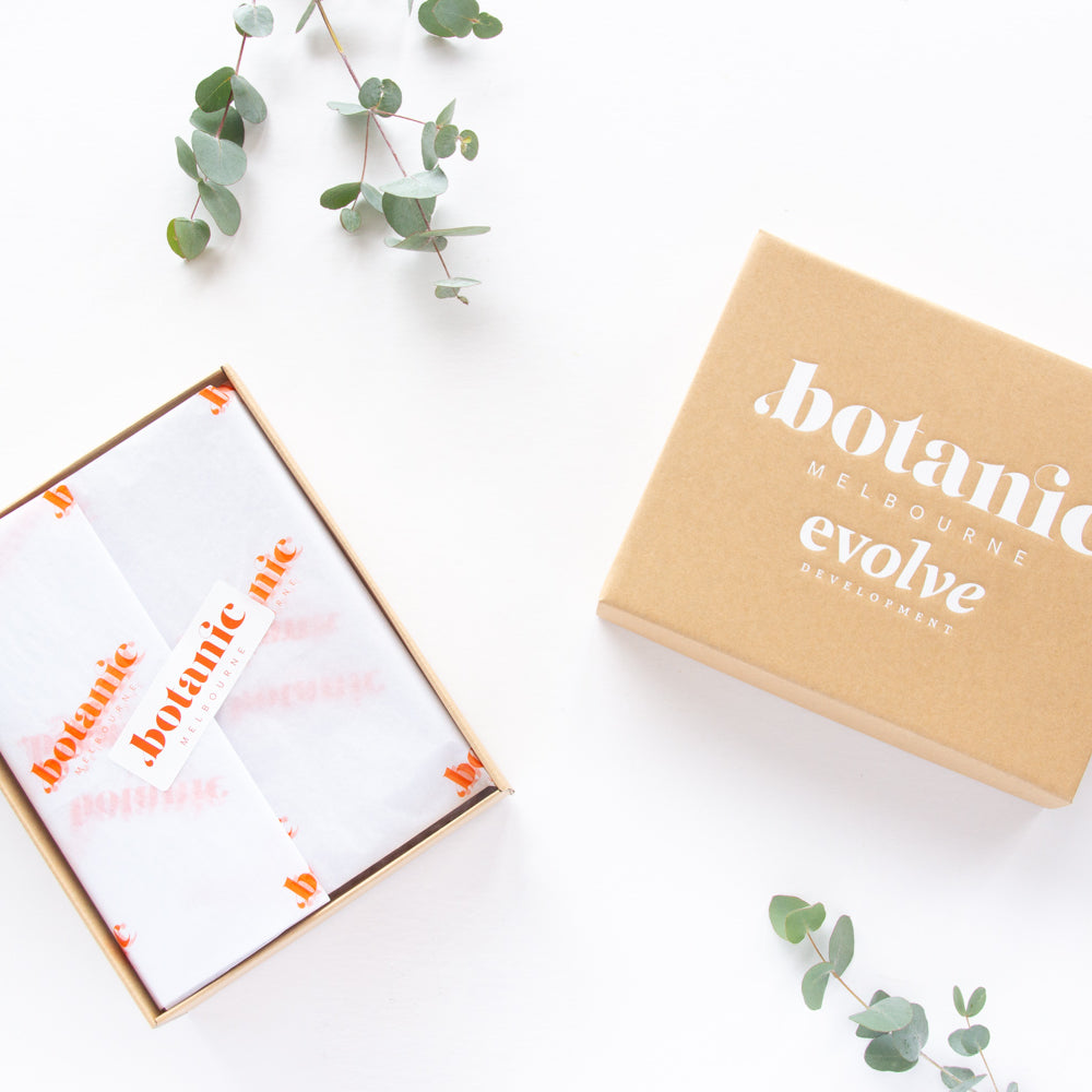 Custom-branded corporate gift hampers with Botanic Melbourne logo and sustainable packaging