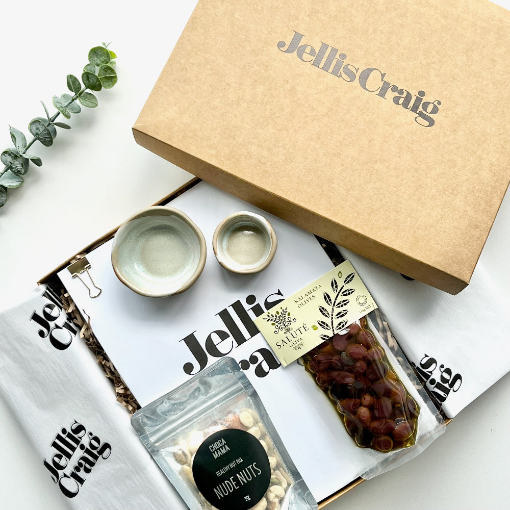 Custom-branded corporate gift hamper with Jellis Craig logo and sustainable packaging