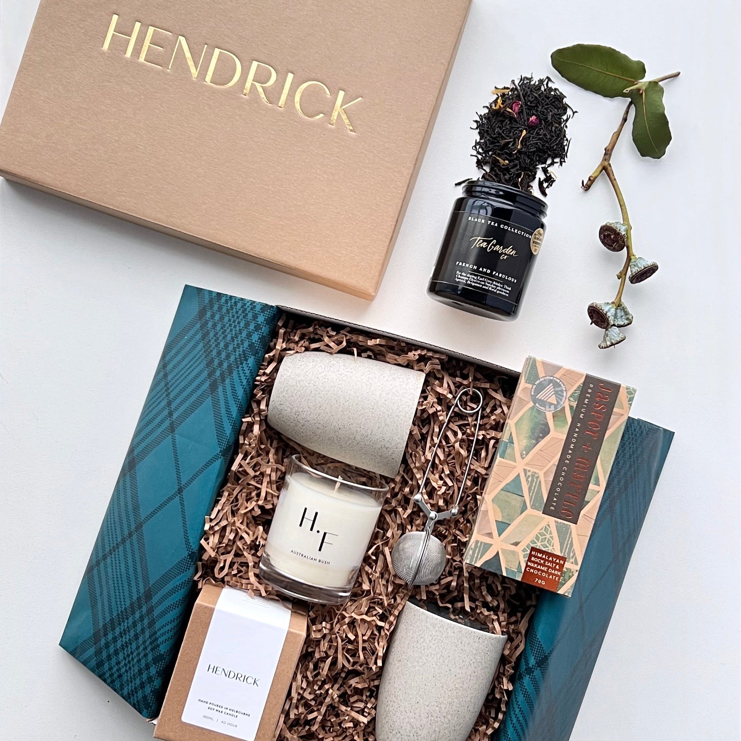 Custom-branded corporate gift hampers with Hendrick logo and sustainable packaging