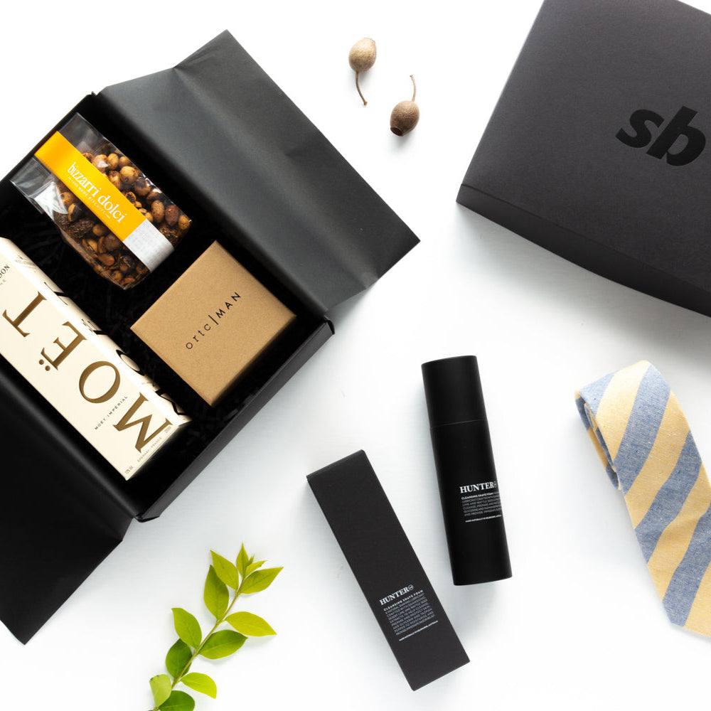 Sports Bet Custom Corporate Hamper Gift luxury products with a black box and yellow striped tie on a white background.