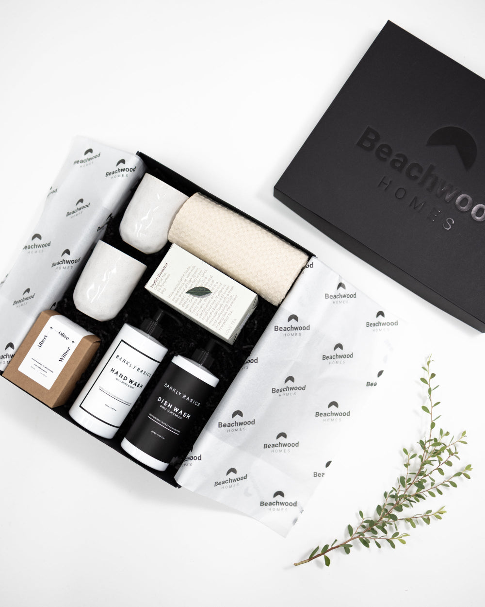 Custom-branded corporate gift hampers with Beach Wood logo and sustainable packaging
