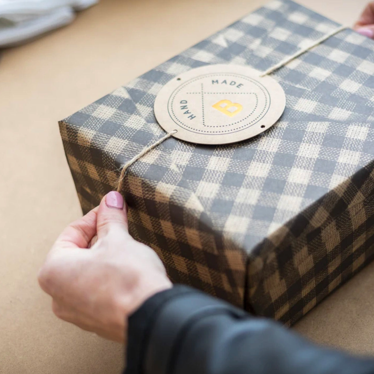 Bindle gift hamper box with hands 