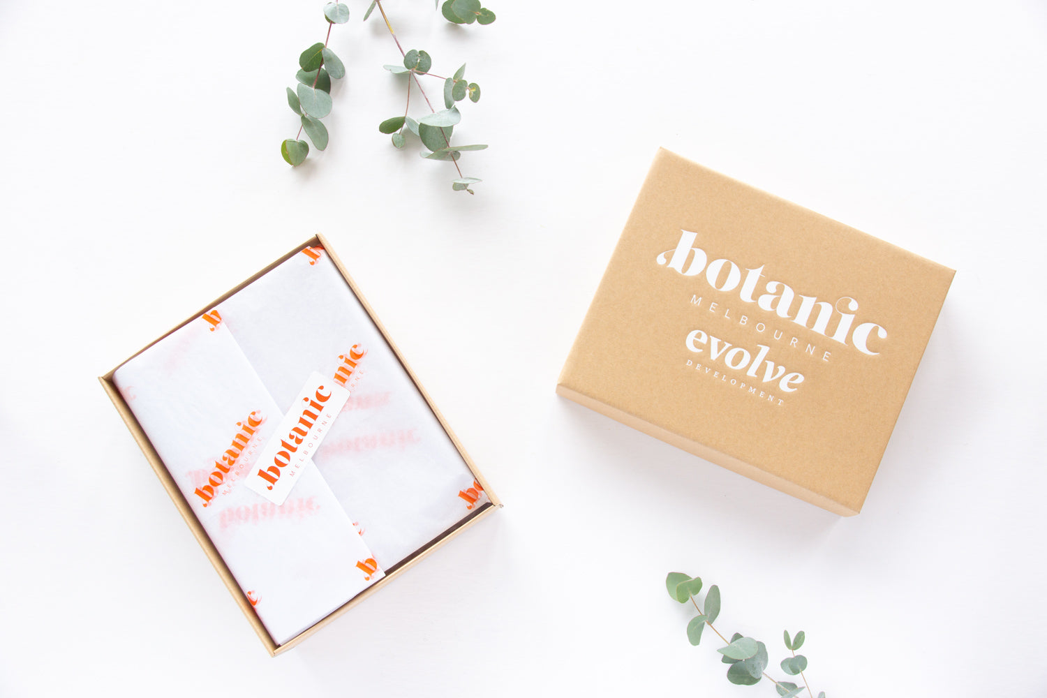 Custom-branded corporate gift hampers with Botanic Melbourne logo and sustainable packaging
