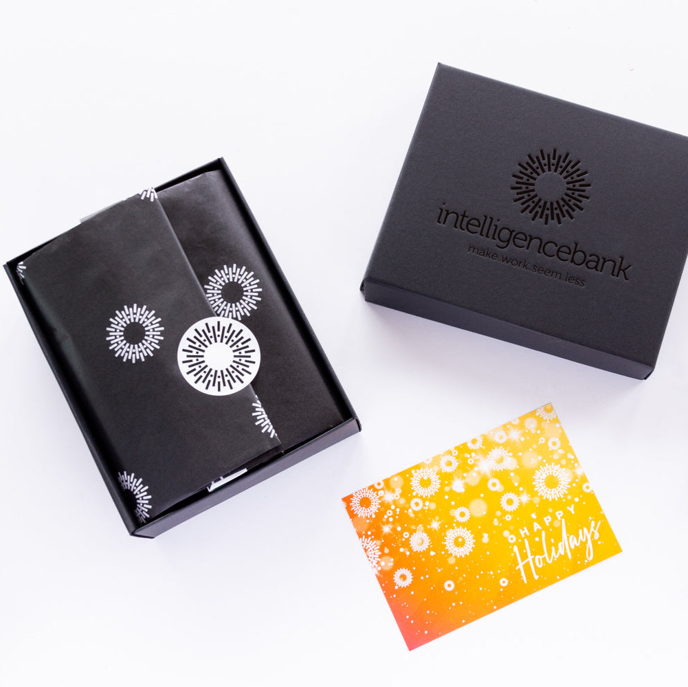 Custom-branded corporate gift hampers with Intelligence Bank logo and sustainable packaging