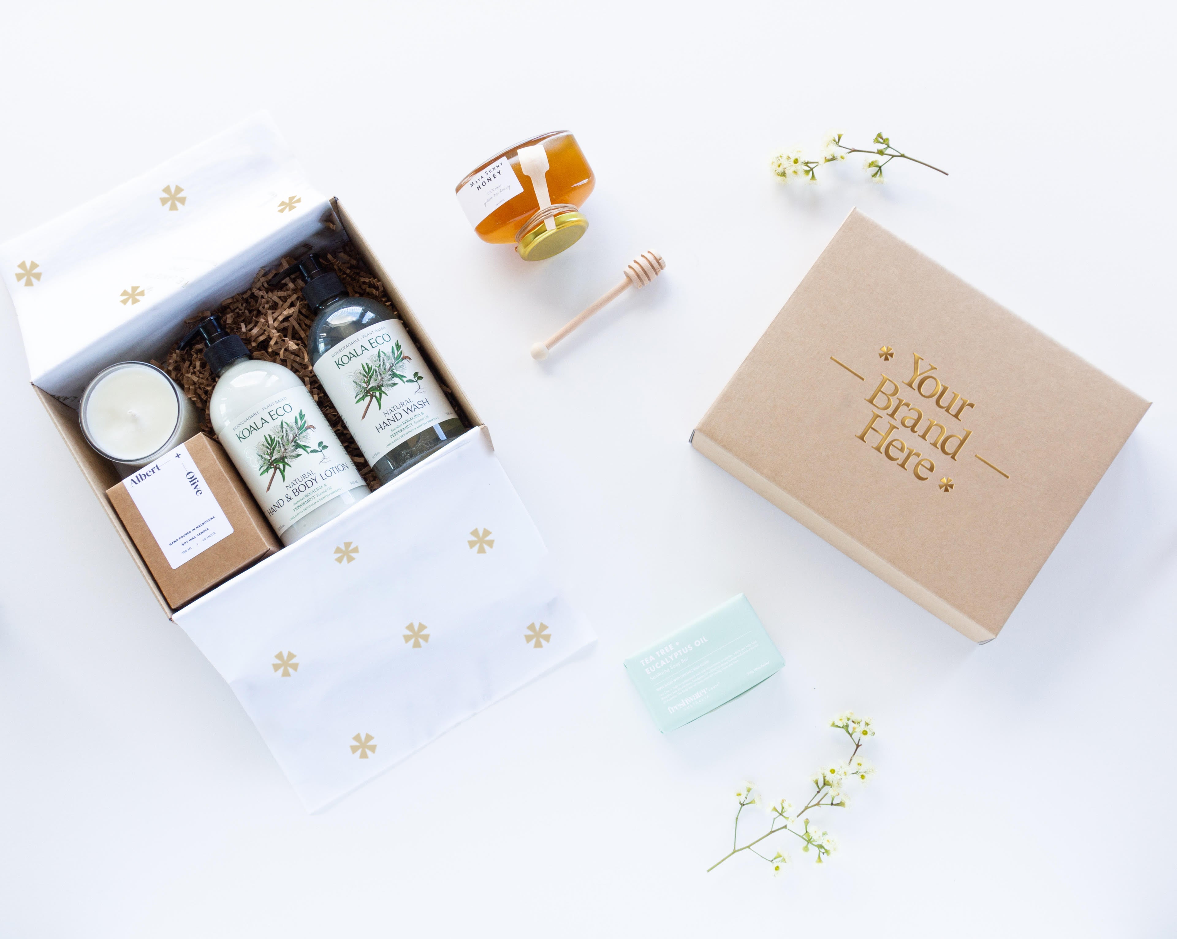 Custom-branded corporate gift hampers with company logo and sustainable packaging
